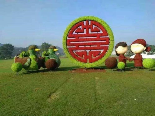 仿真綠雕也可以做沙發的樣子哦 鴛鴦婚慶仿真綠雕批發價